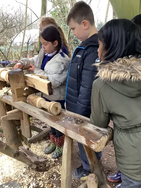 Whipton Barton Pupils exploring saxon style wood turning