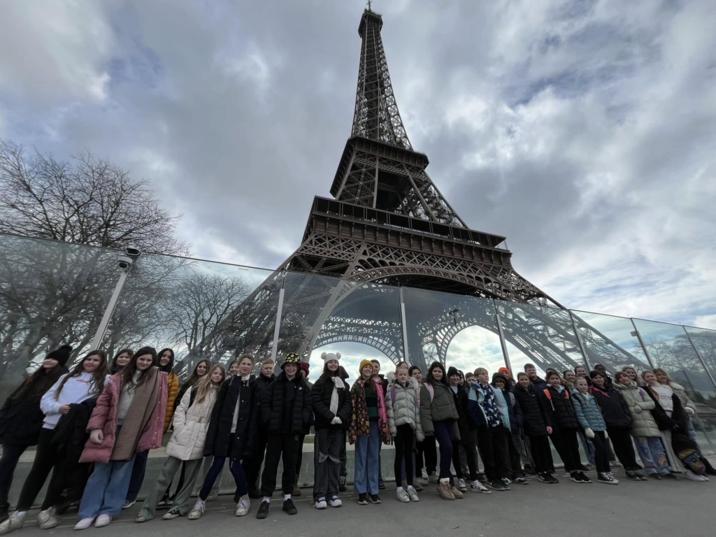 Marine Academy Primary Pupils stood with Eiffel Tower in background