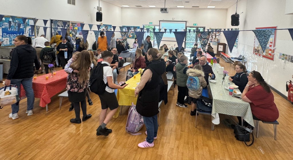 Students and their families enjoying breakfast