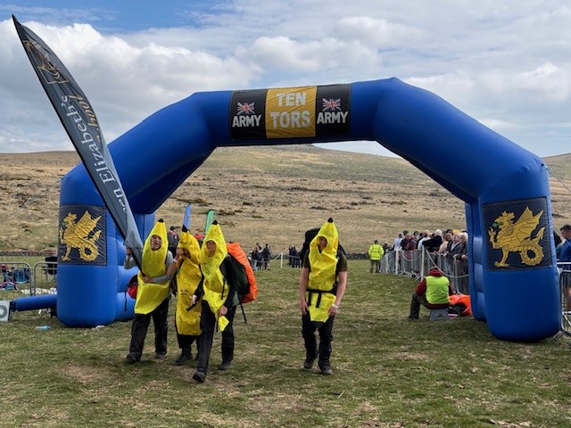 QE students finishing the Ten Tors with Banana suits on