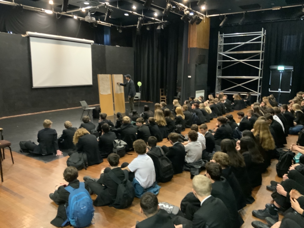 Author Steven Camden providing assembly to children at QE