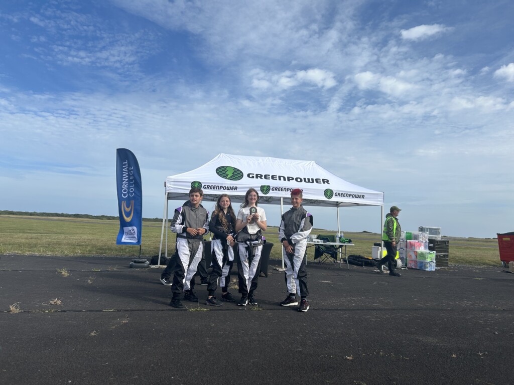 GreenPower engineering and racing team stood infront of gazebo