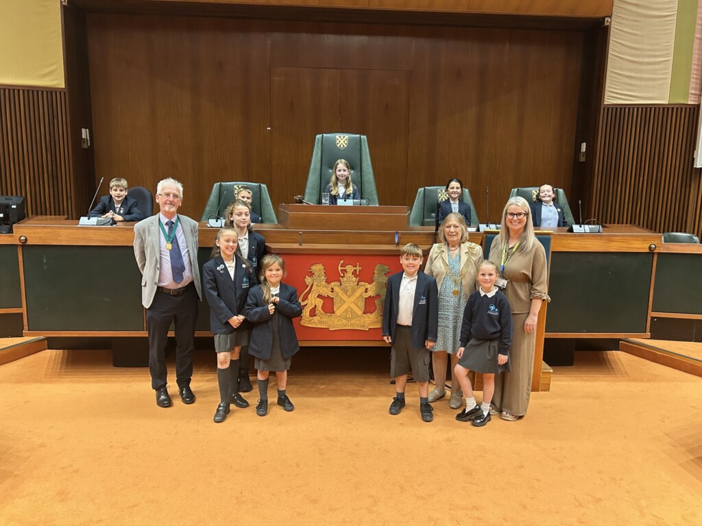Pupils from Marine Academy Primary at the Council Chambers  stood with the Lord Mayor