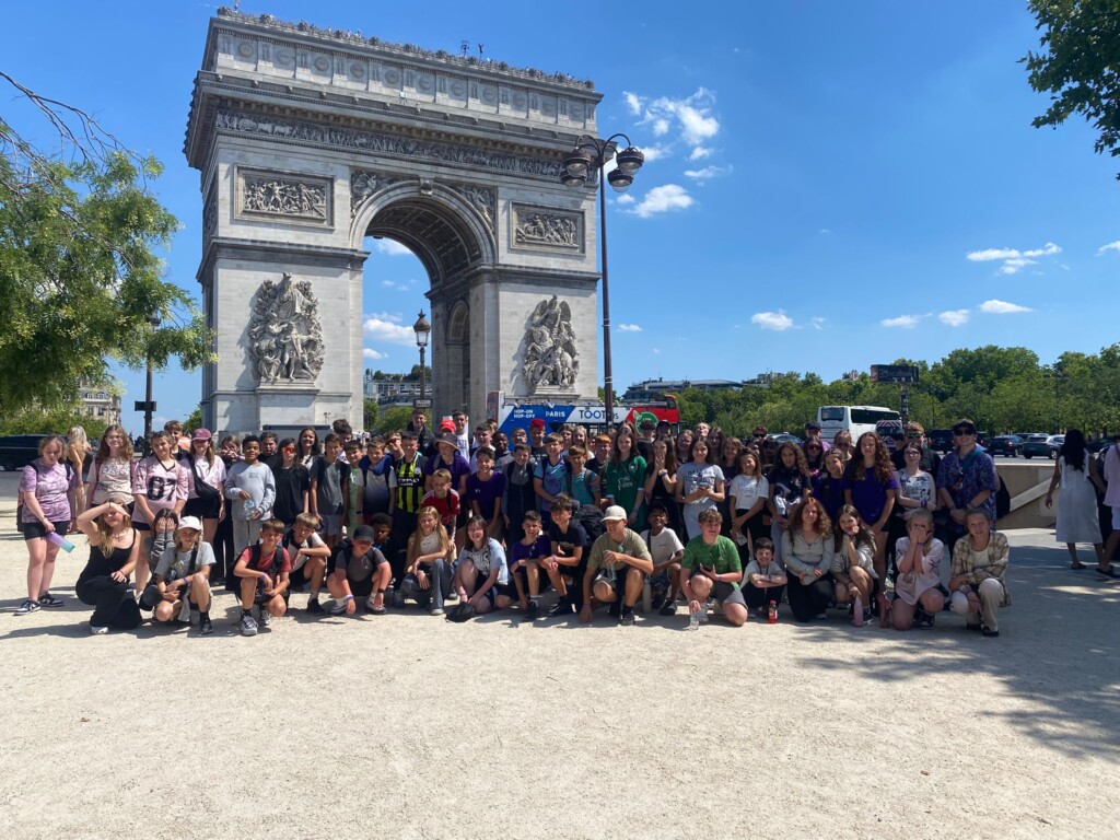 ASAP students in paris in front of the Arc de Triomphe