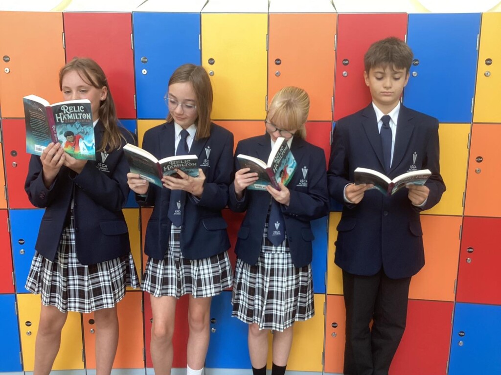 isca students getting-stuck-in reading books