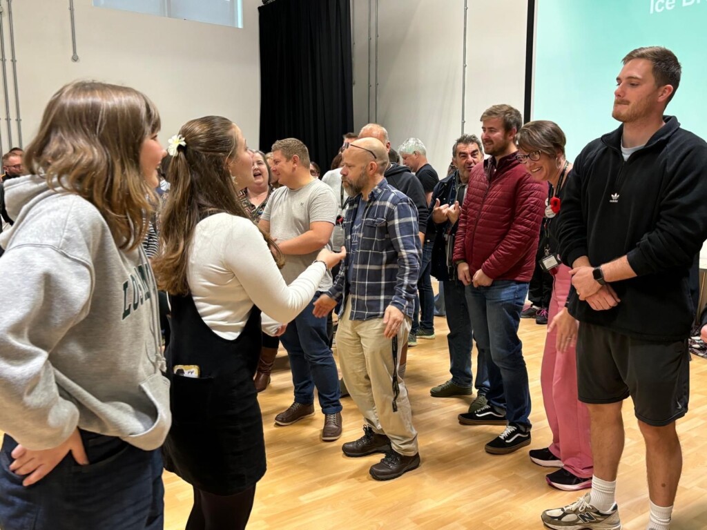students-doing-training-with-staff