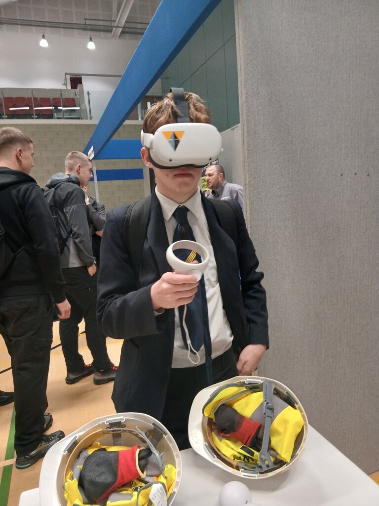 Student stood using a VR headset