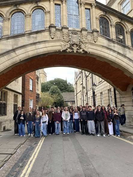Students pose under the 'Bridge of Sighs'