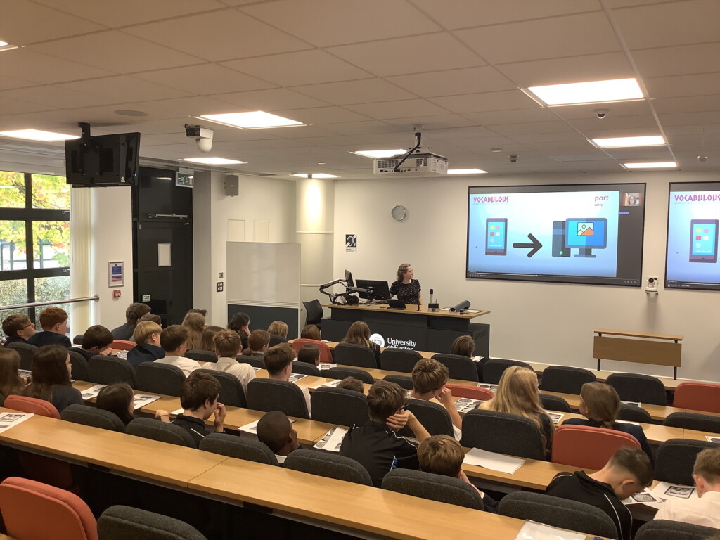 Students sat in rows in a lecture theatre