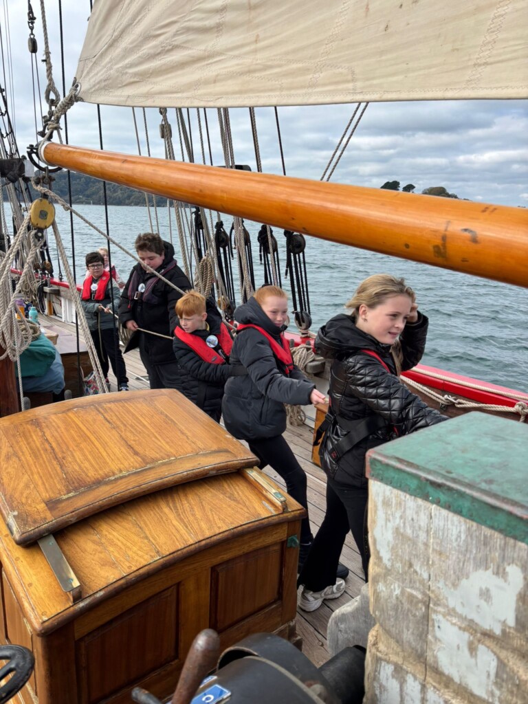 Marine Academy Pupils on a sailing boat, all hands on deck