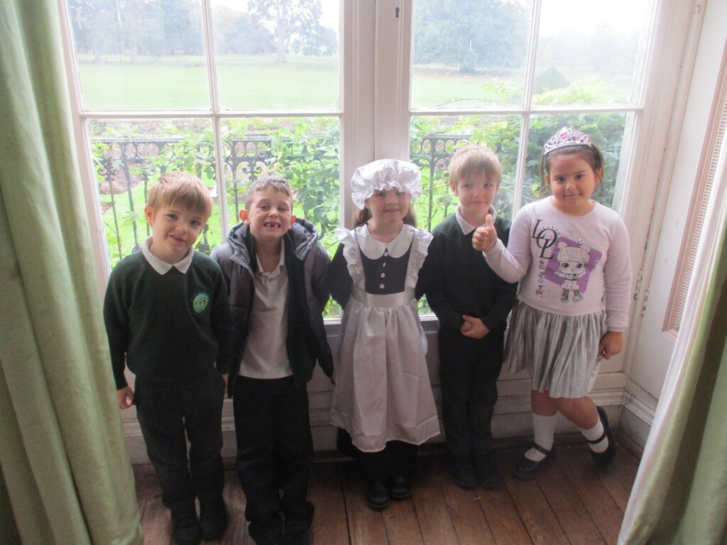 Exwick Heights School Pupils dressing up in old fashions clothes at Powderham Castle