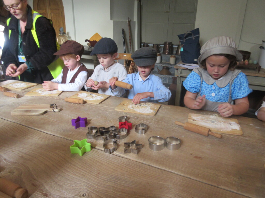 Exwick Heights School Pupils baking in the kitchen at Powderham Castle