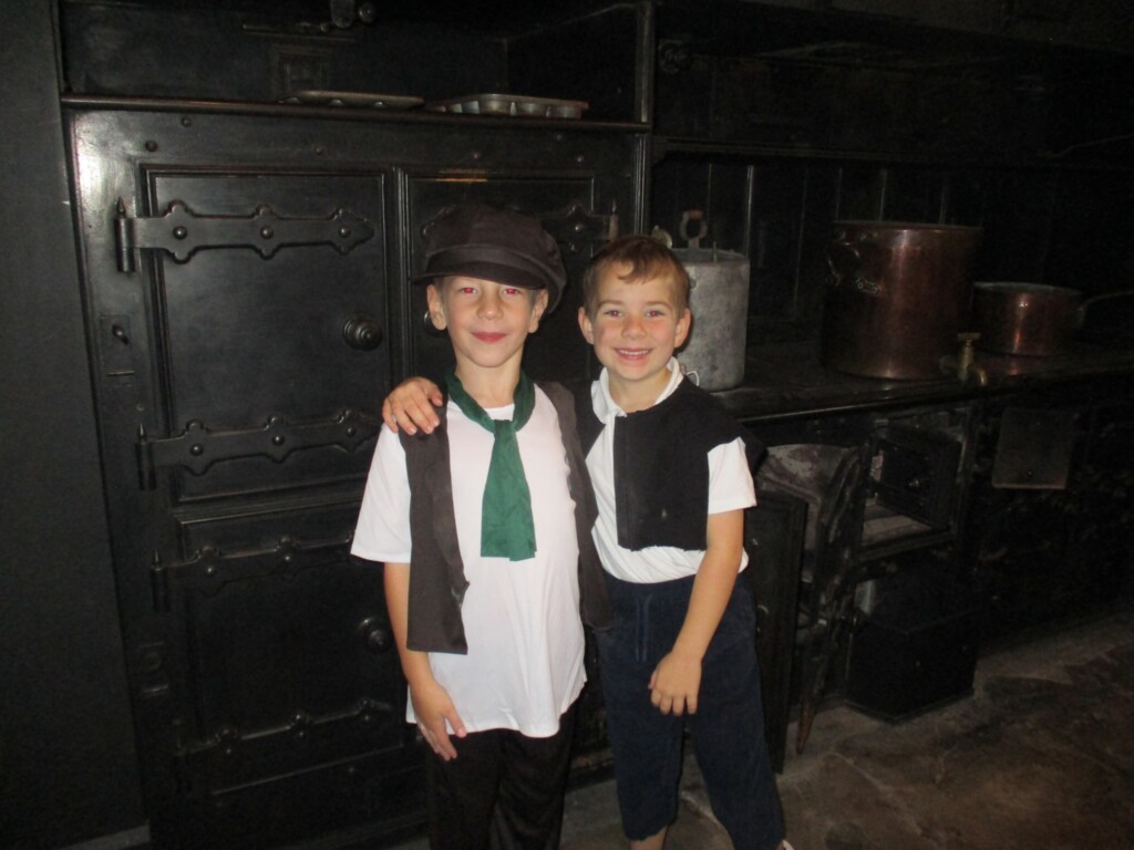 Exwick Heights School Pupils dressing up in old fashions clothes at Powderham Castle