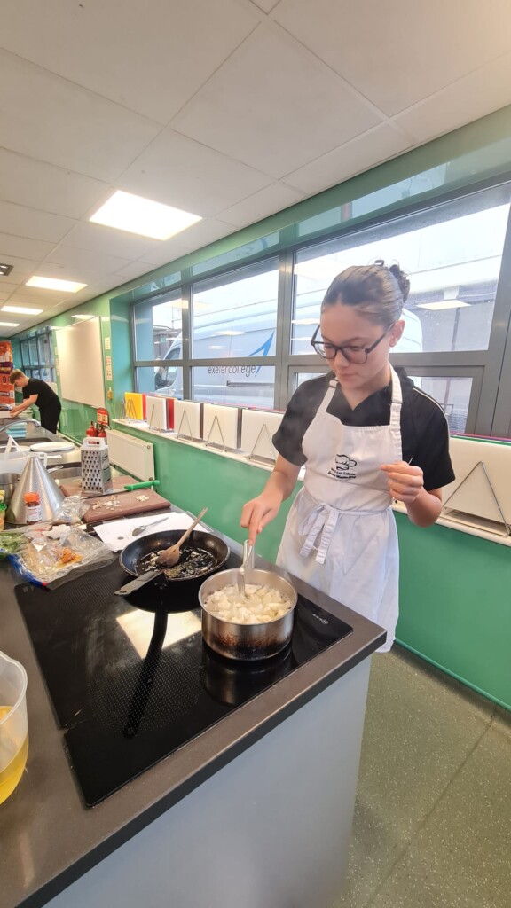 Student Ruby from West Exe cooking