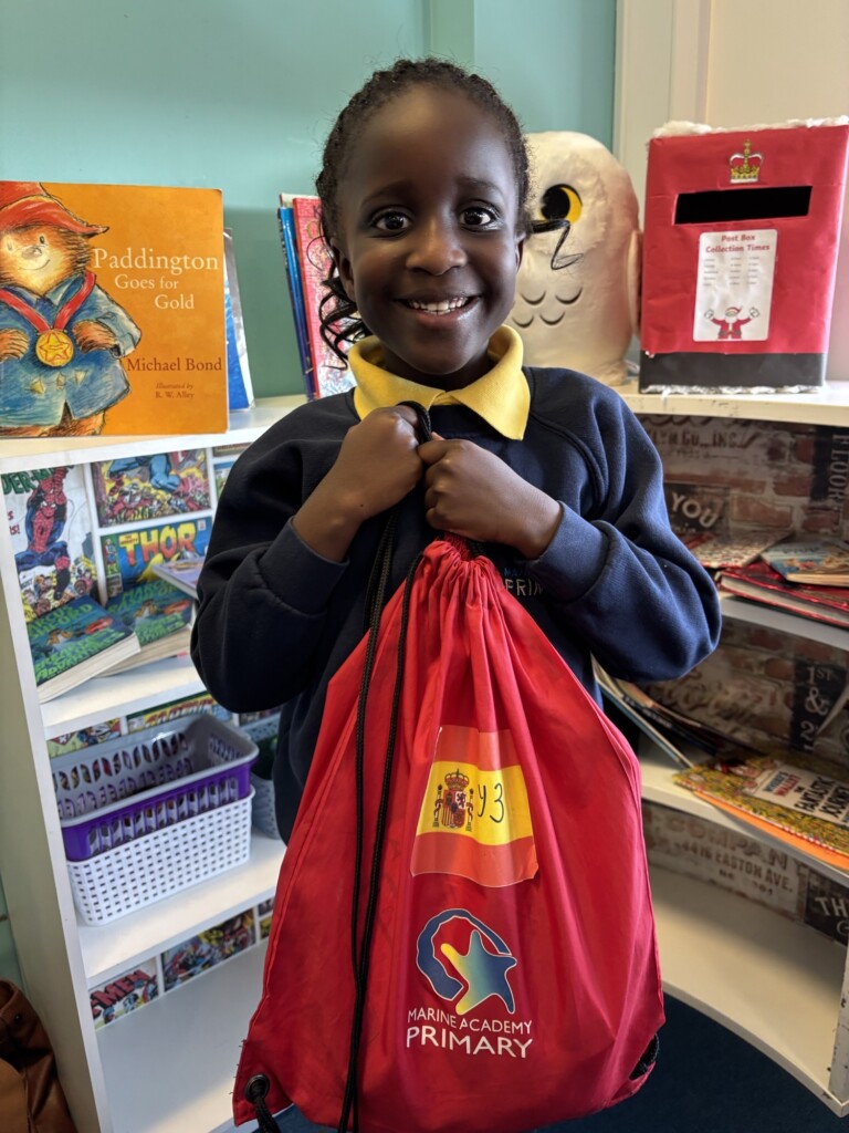 One Marine Academy Pupil holding a bag