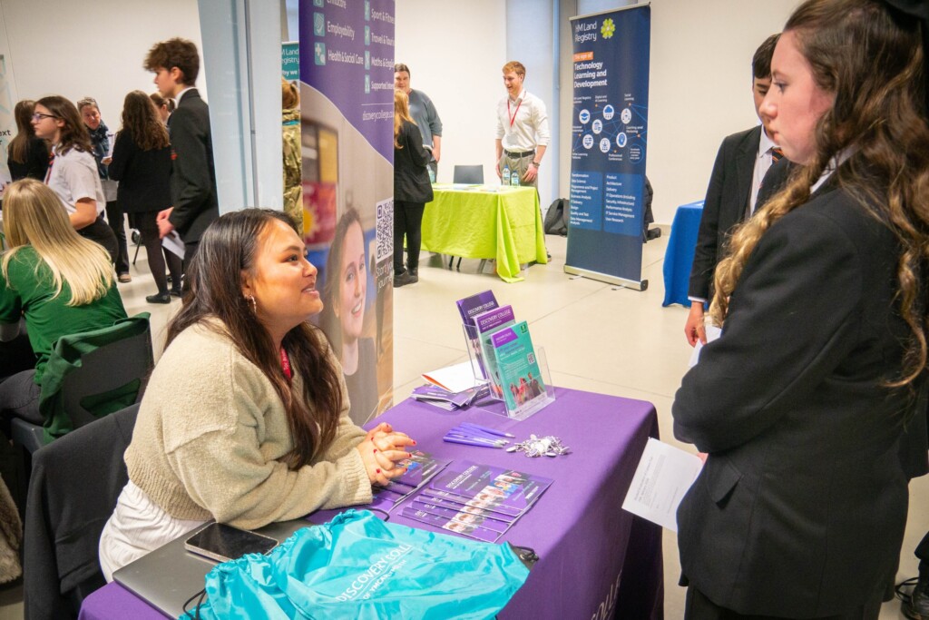 Students from Tor Bridge High talking to employers at careers fair