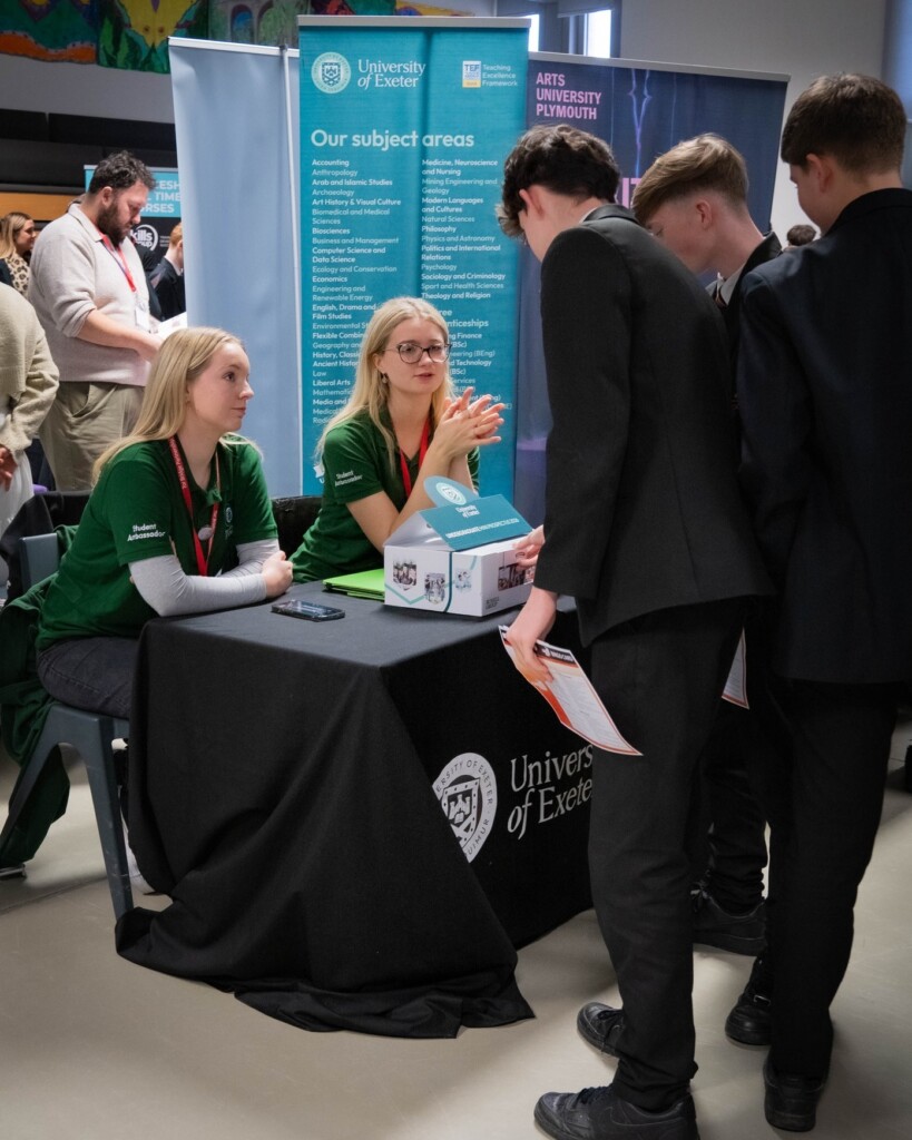 Students from Tor Bridge High talking to employers at careers fair