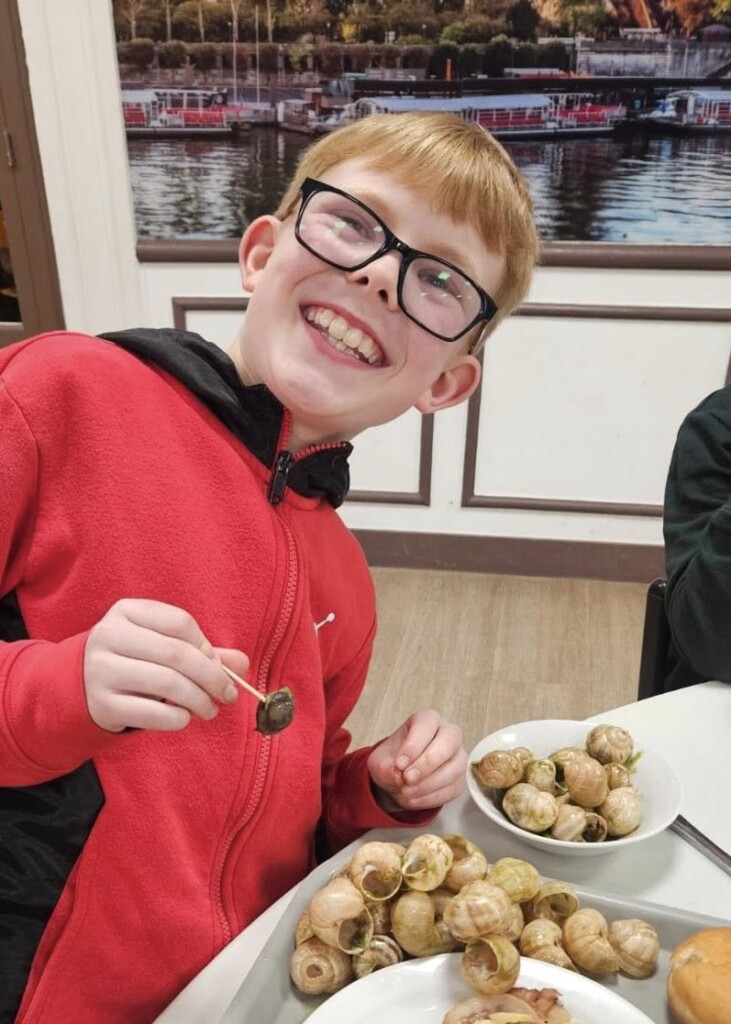 An exwick heights pupil tucks into his parisian escargot