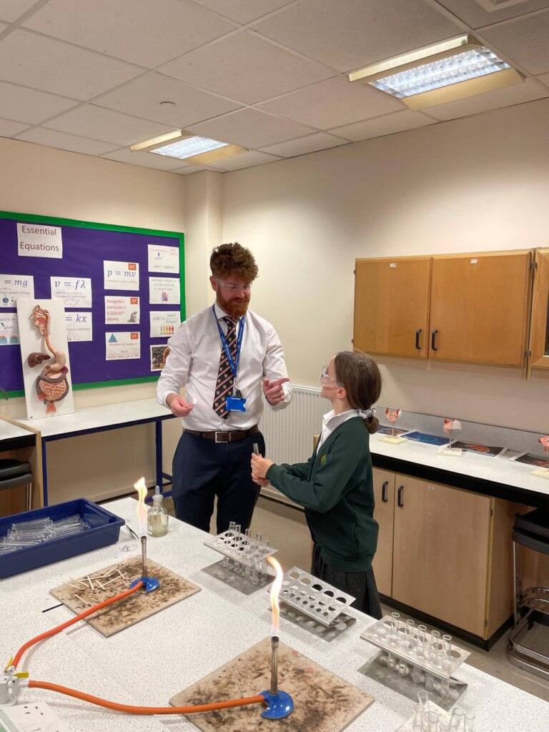 Teacher demonstrating experiment