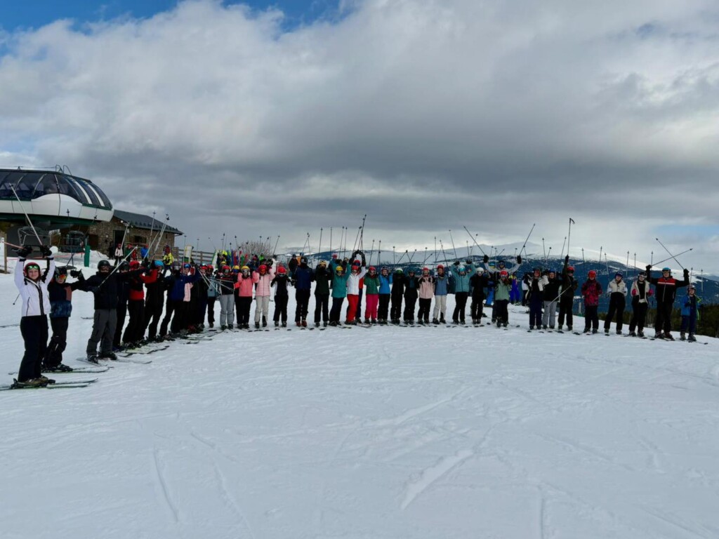 Lots of Isca students stood on snow