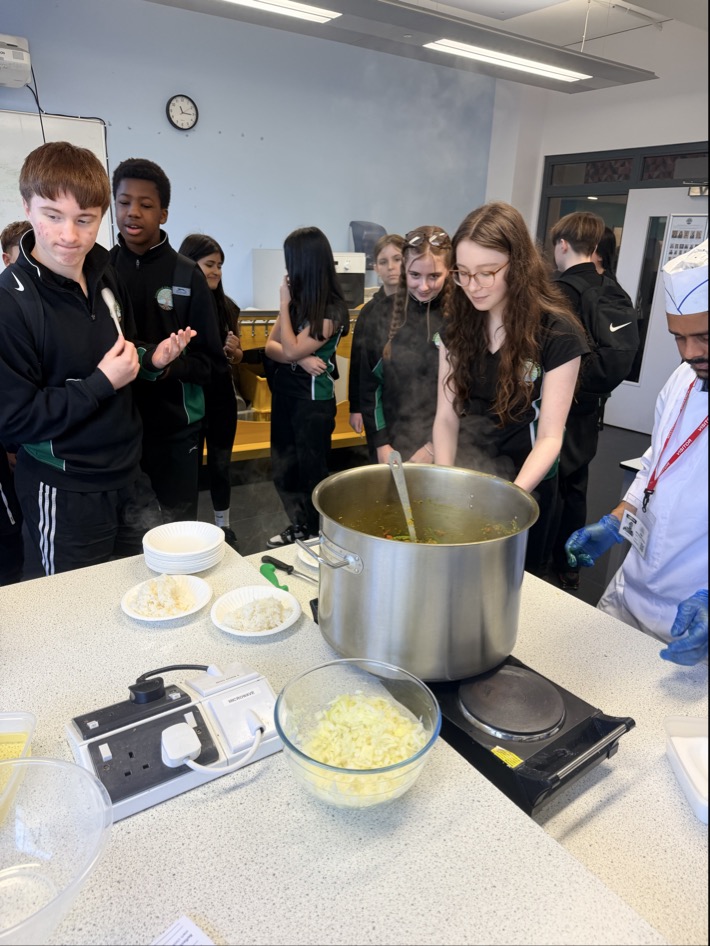 Cranbrook students cooking alongside chef