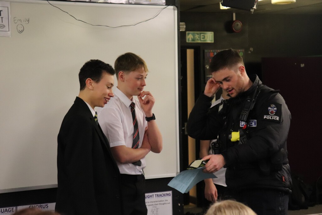 Police talk to students from sidmouth during their drink drive workshop