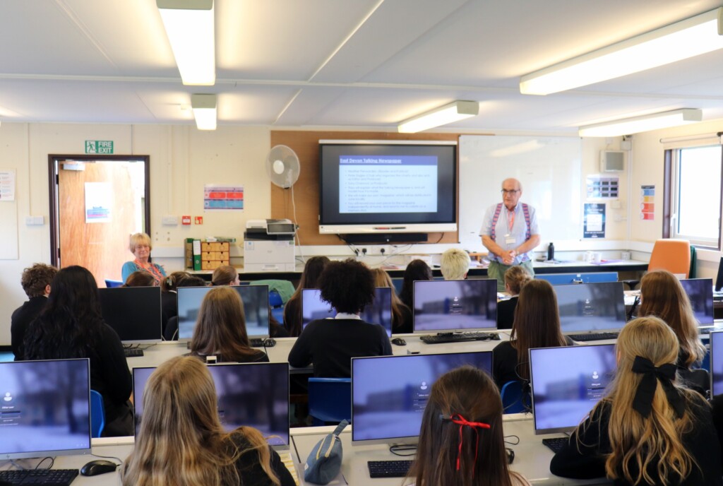 Students listening to a presentation.
