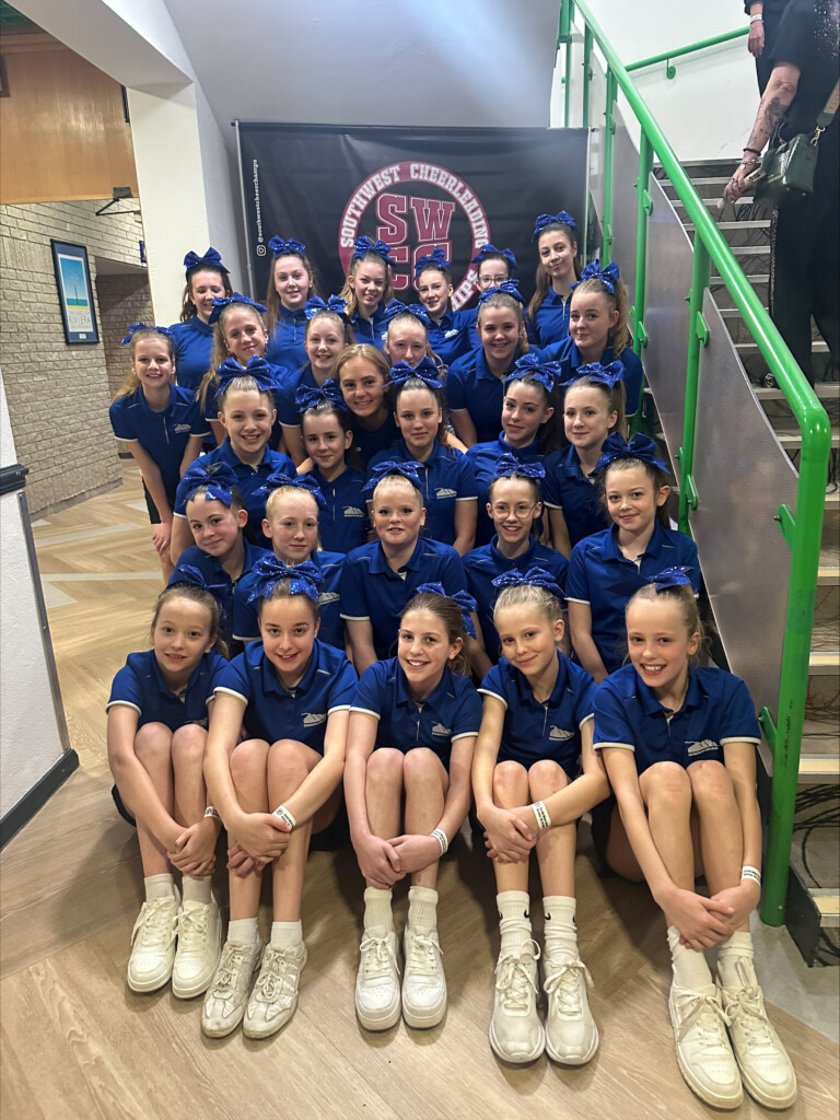 The triumphant Sidmouth College cheerleading team