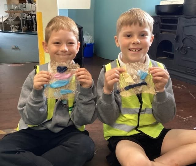 Pupils showing their crafts