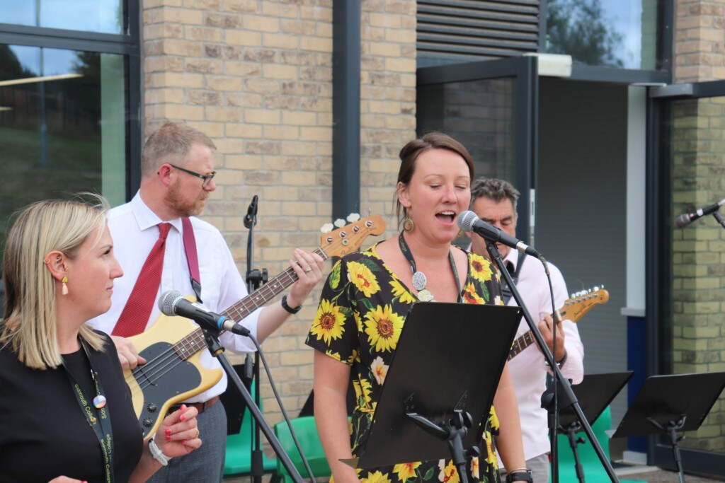 A member of staff performing