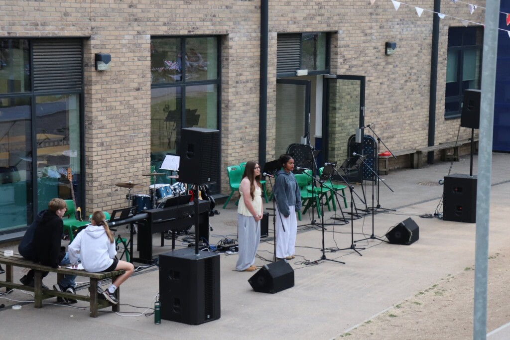 Two students singing