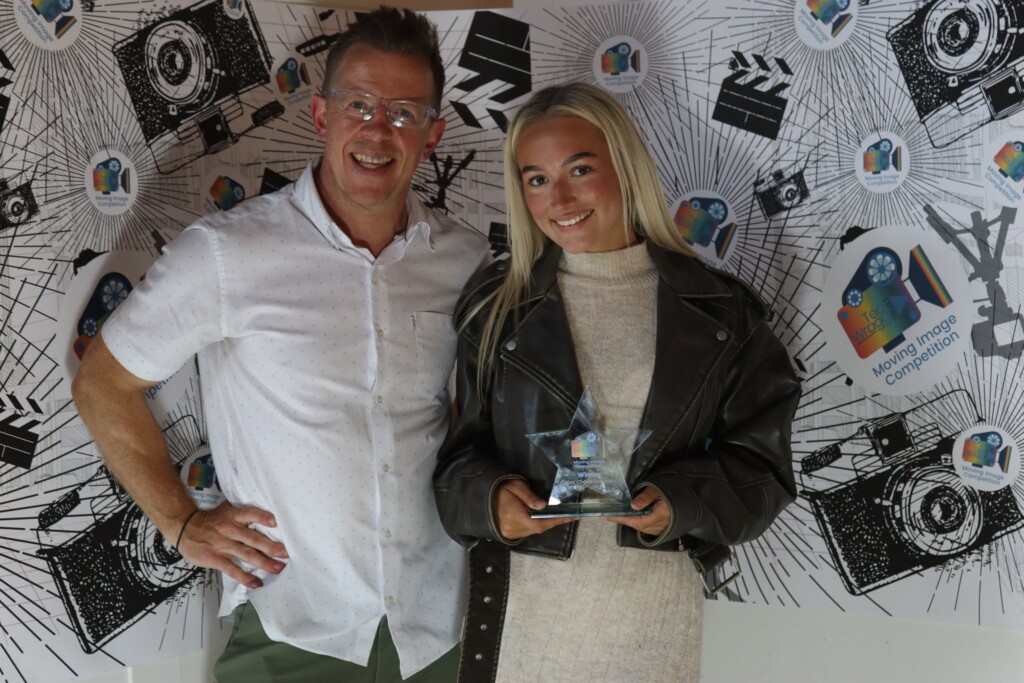 Event Organiser Rhys with a winning student