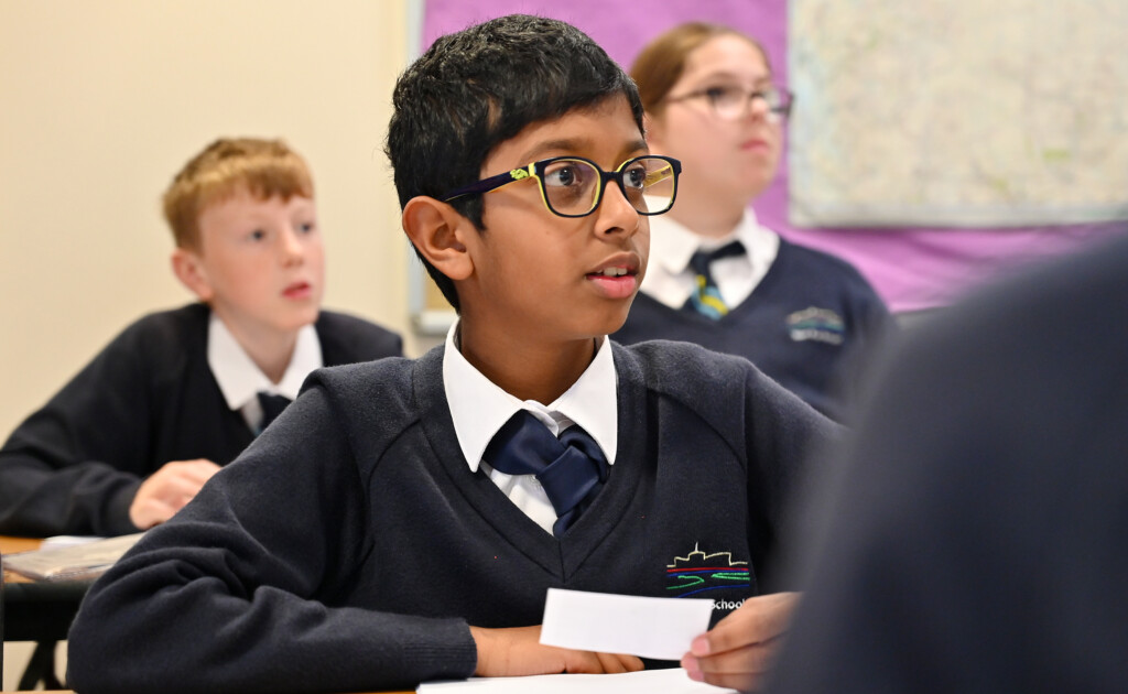 A pupil paying attention in class