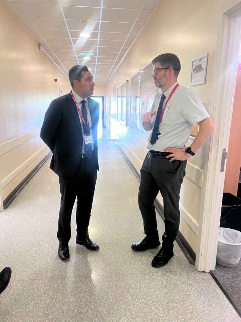 Lindsay Coren shows Mr Reed around the Maths department